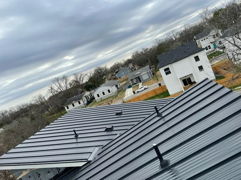 Standing seam metal roof panels with vents for Skylight Repair in Brookside